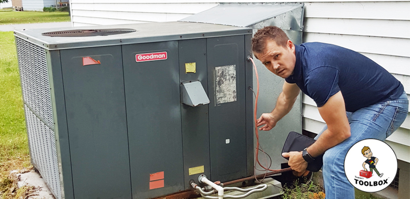 Photo of Tracey Miller, Realtor explaining HVAC system
