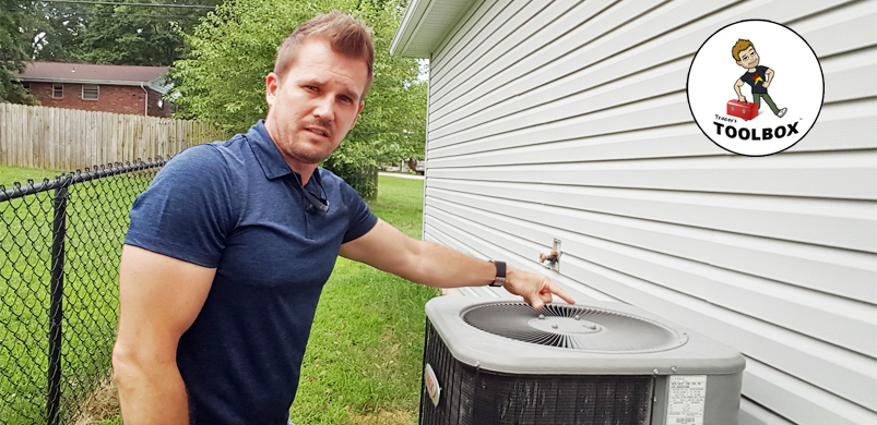 Photo of Tracey Miller, Realtor cleaning central AC unit