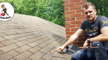 Photo of Tracey Miller, Realtor repairing roof shingles