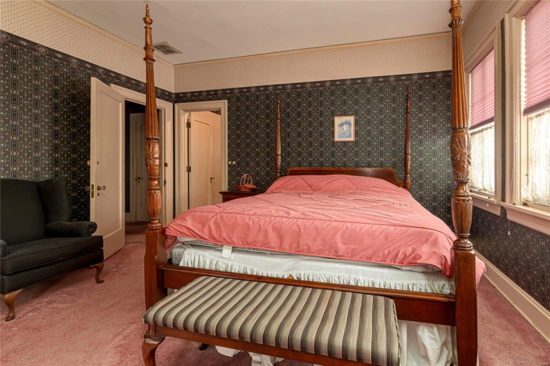 Bedroom with carpet flooring