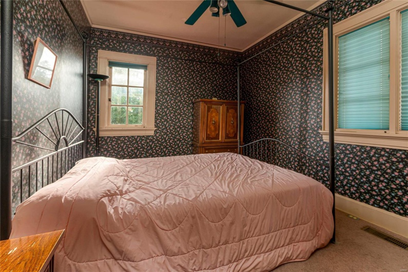 Bedroom with carpet floors and ceiling fan
