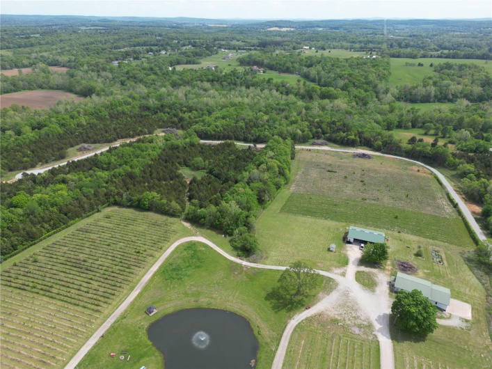 Drone / aerial view with a rural view and a water view