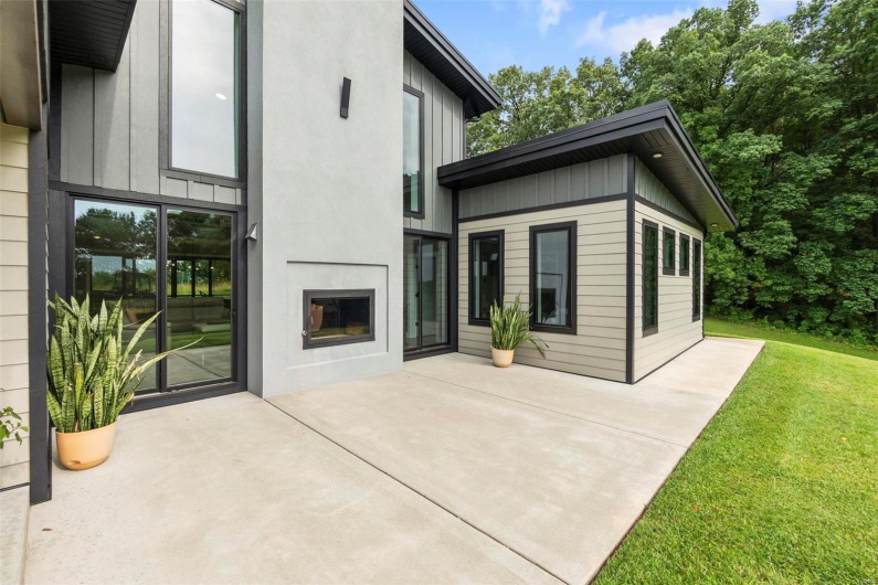 Enjoy your two sided fireplace on our patio or in your greatroom