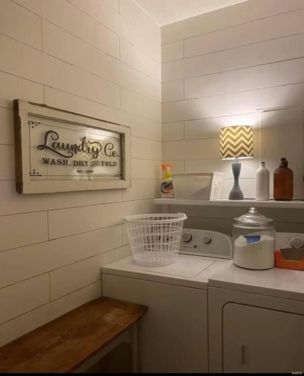 Washroom with washing machine and dryer