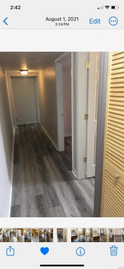 Corridor with wood-type flooring