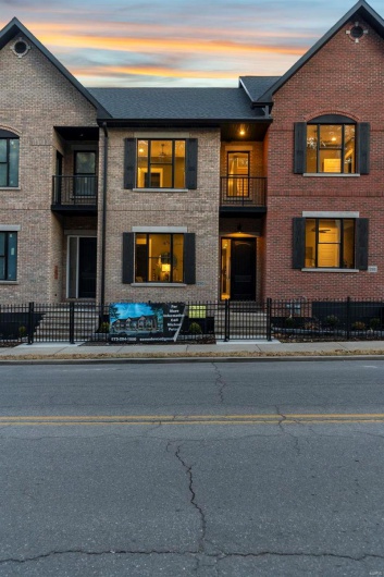 View of front of home with a balcony