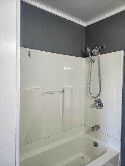 Full bathroom with bathtub / shower combination
