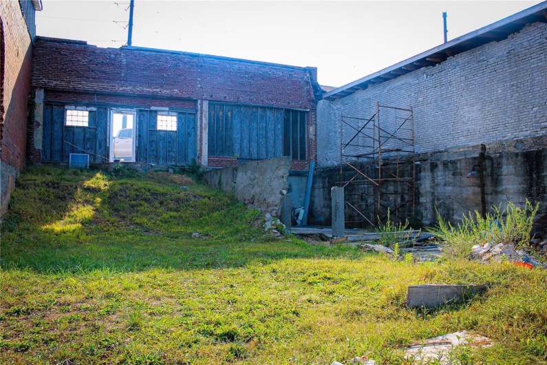 615 is a brick front only. Building was torn down.