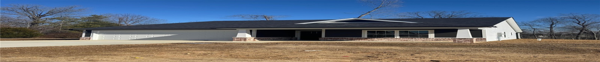 Residential For Sale View of front facade with a porch and a garage