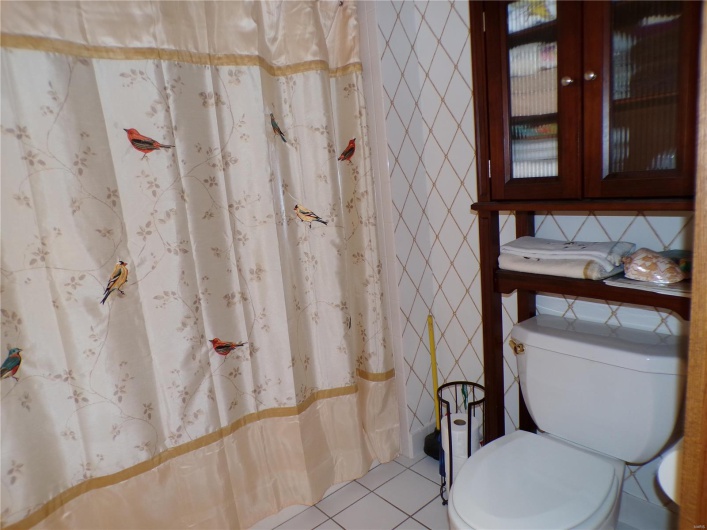 Main Bath attached to 1st floor Bedroom 