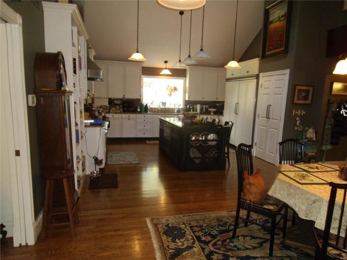 Large Central Island Built-in Refrigerator and Freezer huge pantry