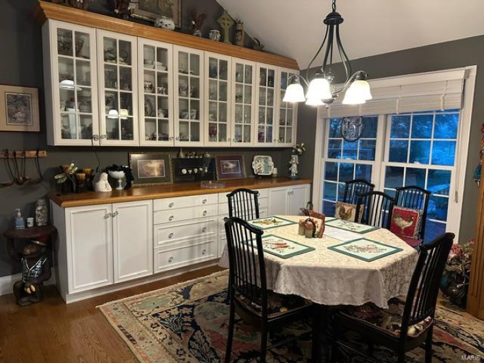 Informal Dining with huge wall of storage