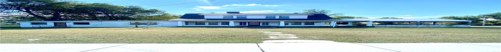 Residential For Sale View of front facade featuring a front lawn and covered porch