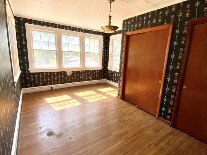 Empty room featuring light wood-type flooring