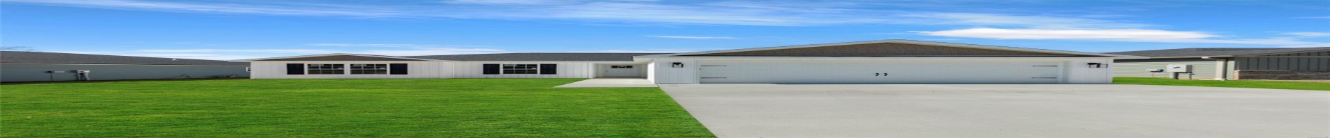 Residential For Sale Single story home featuring a front lawn, an attached garage, and concrete driveway