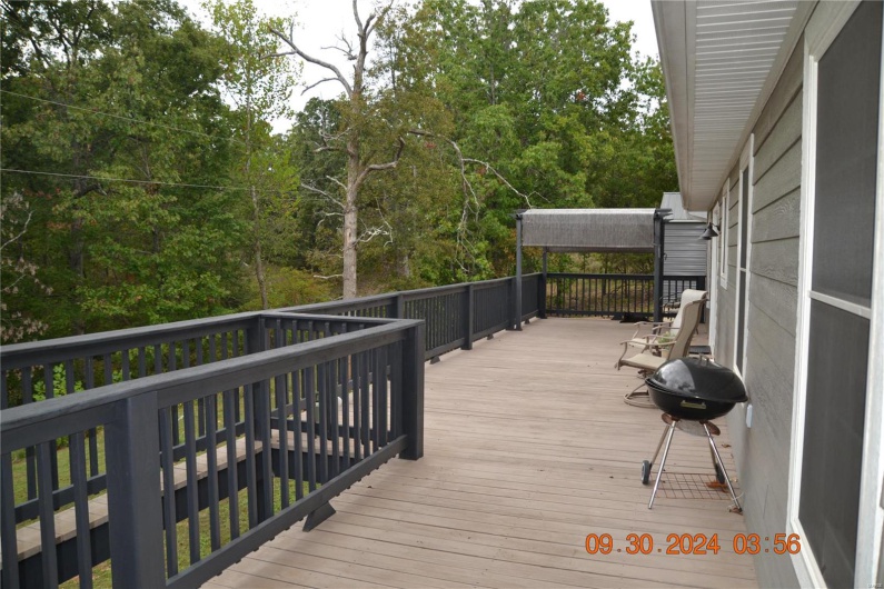 Wooden deck with area for entertaining