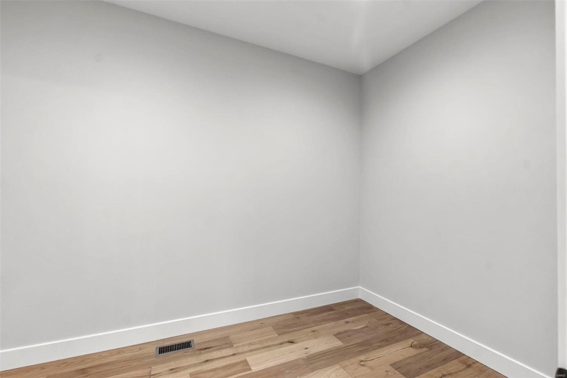 Spare room featuring light hardwood / wood-style floors