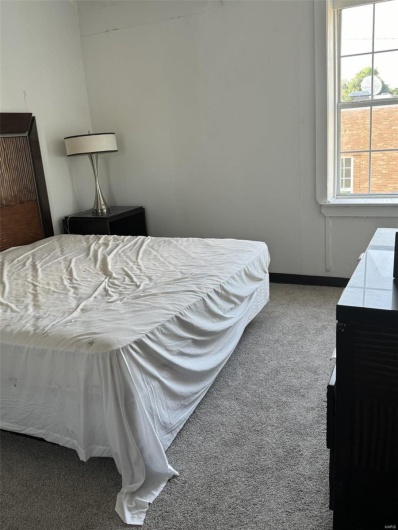 Bedroom with carpet flooring