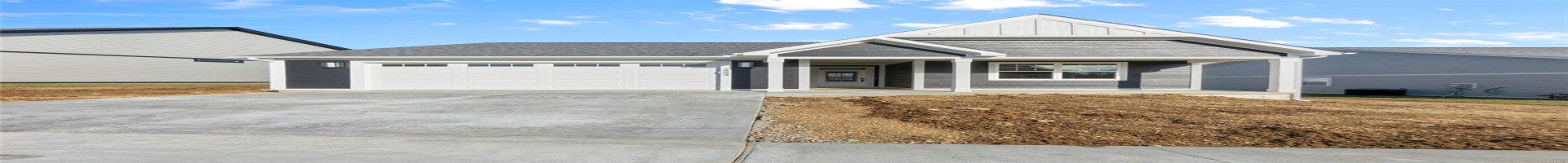 Residential For Sale View of front of house with a porch, an attached garage, central AC unit, board and batten siding, and driveway