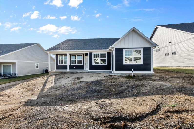 View of front of home featuring board and batten siding
