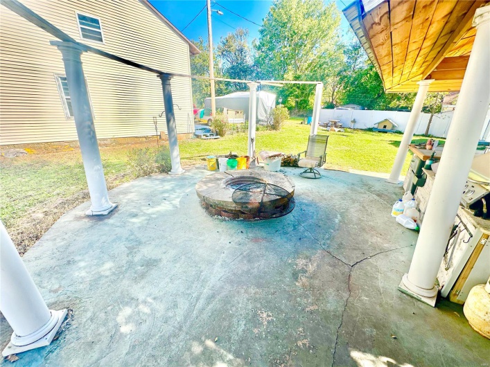 View of patio / terrace featuring an outdoor fire pit