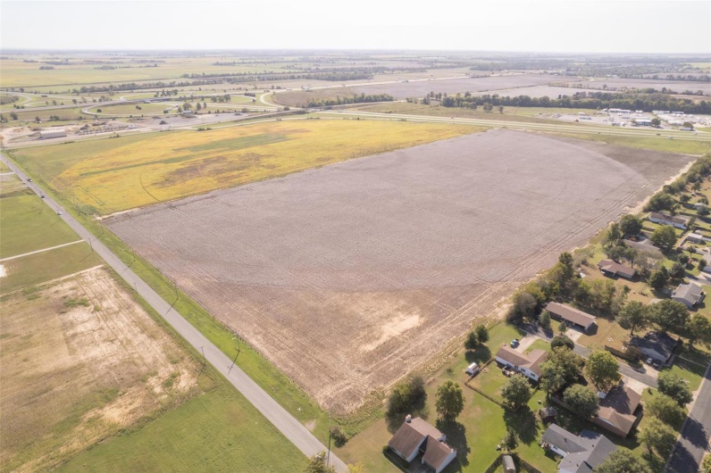 Birds eye view of property with a rural view