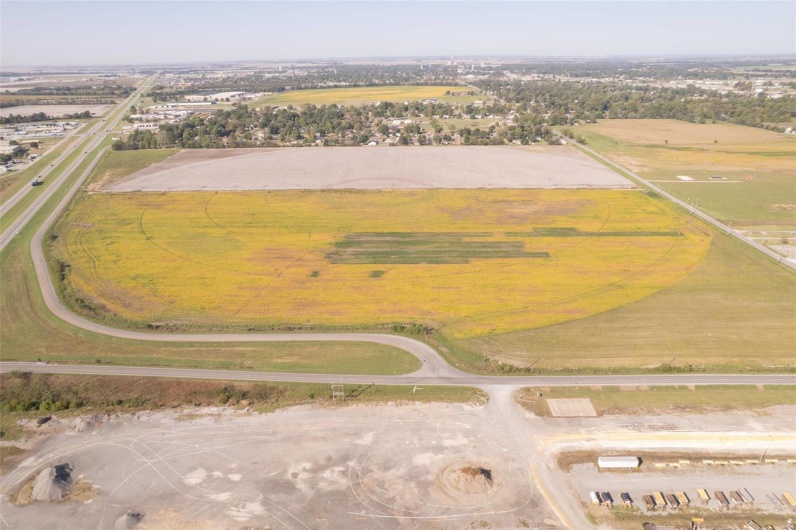 Birds eye view of property featuring a rural view
