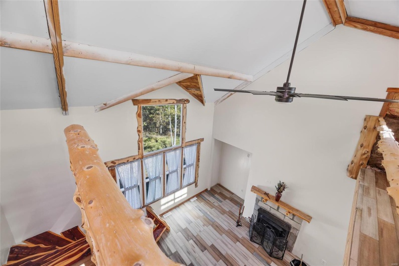 More views of vaulted ceilings and natural wood features