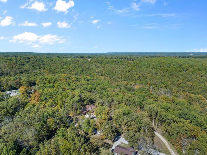 More aerial views of the home and nearby area