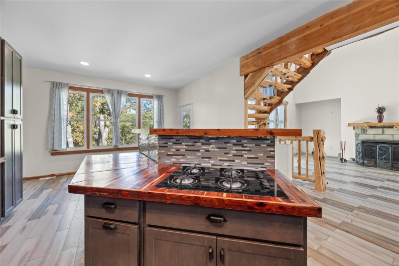 Kitchen offers more view of the natural rustic features