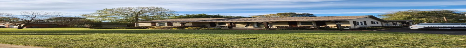 Residential For Sale Ranch-style home featuring covered porch and a front lawn