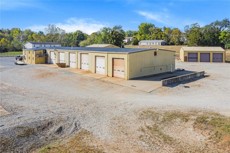 Main shop, 4 work bays, 2 drive through wash bays