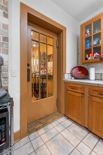 Kitchen featuring light tile patterned floors