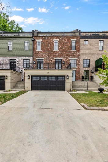View of property with a garage