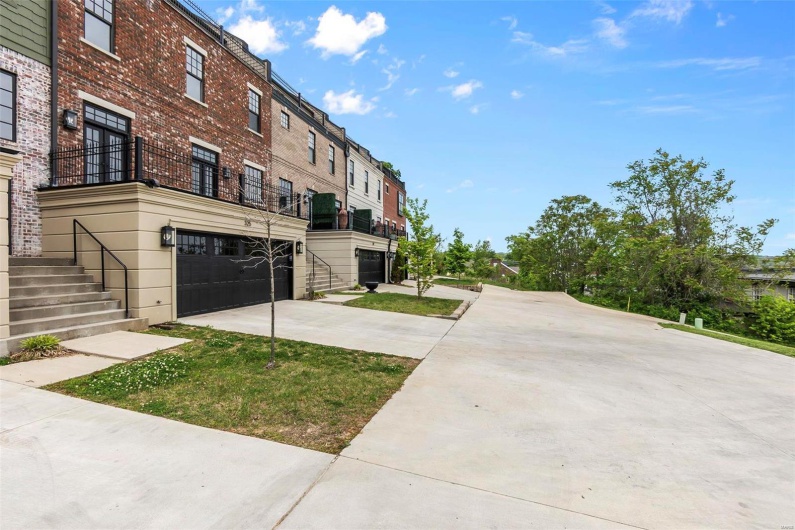 View of property with a garage