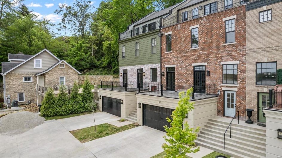 View of property with a garage