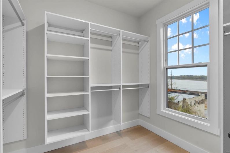 Walk in closet featuring wood-type flooring