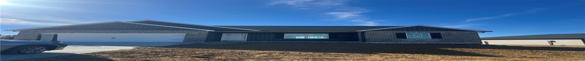Residential For Sale View of front facade with a garage