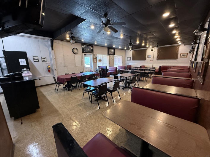 Dining area featuring a paneled ceiling and ceiling fan