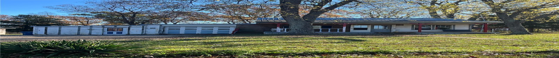 Residential For Sale View of front of home with a front lawn and covered porch