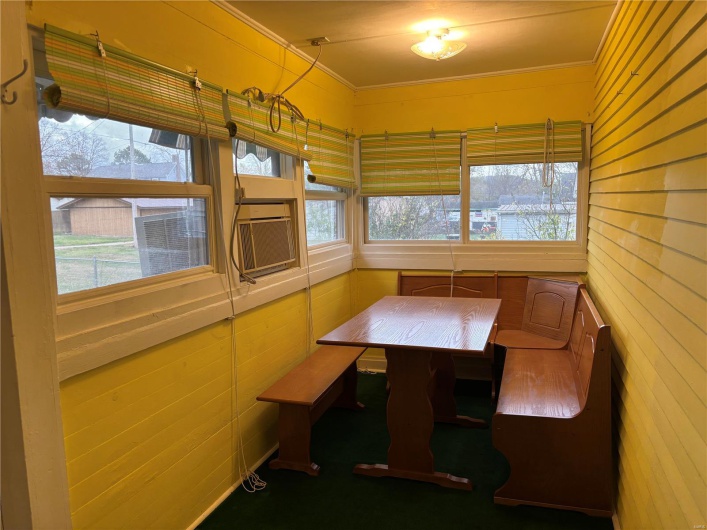 Unfurnished dining area featuring ornamental molding