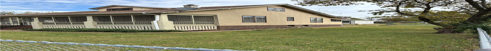 Residential For Sale View of side of property featuring front screened porch and side yard