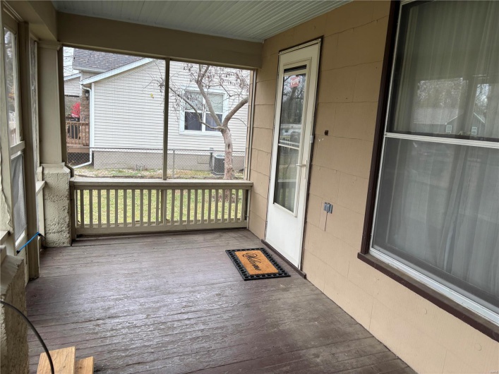 View of unfurnished screened front porch 