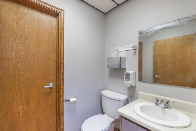 Bathroom with vanity and toilet