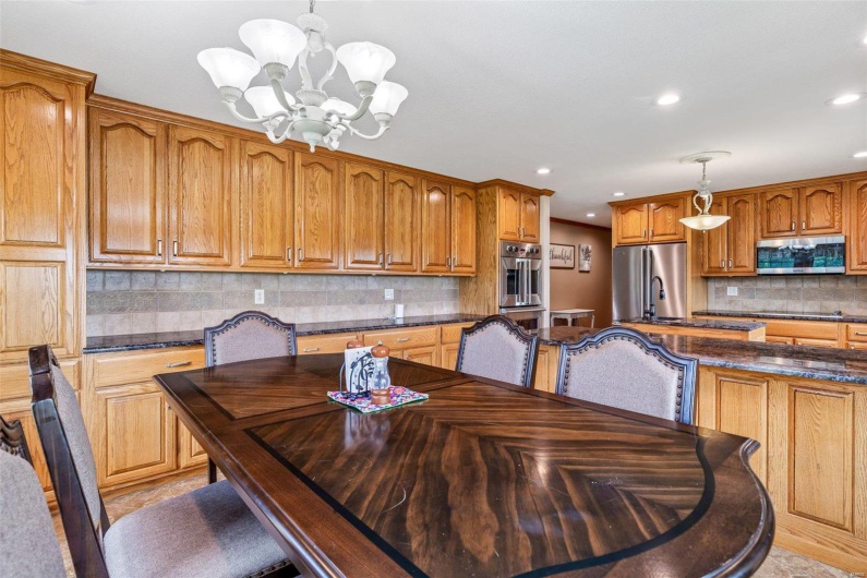 Dining area with an inviting chandelier