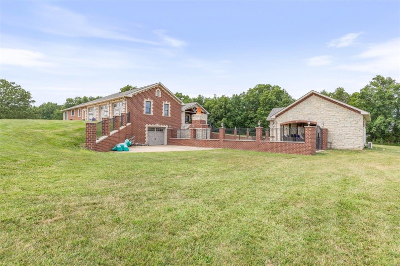 View of yard featuring a garage