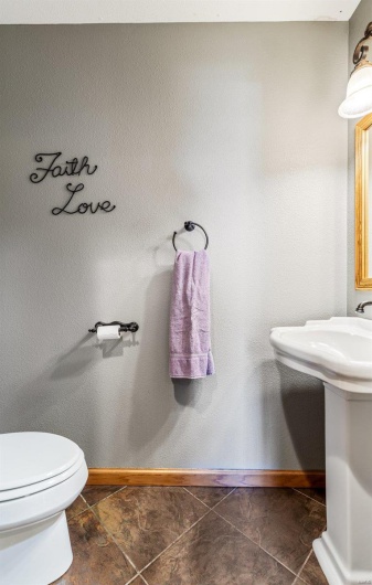 Bathroom with tile patterned floors and toilet