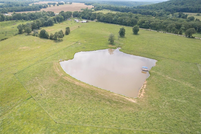 Bird's eye view with a rural view and a water view