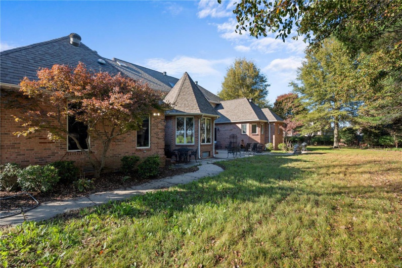 Exterior space featuring a lawn and a patio