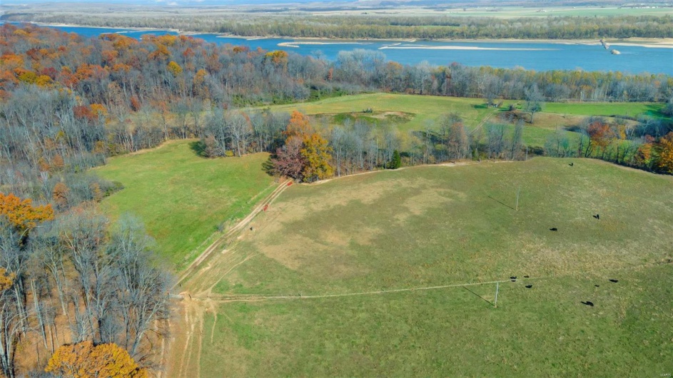 Drone / aerial view featuring a rural view and a water view